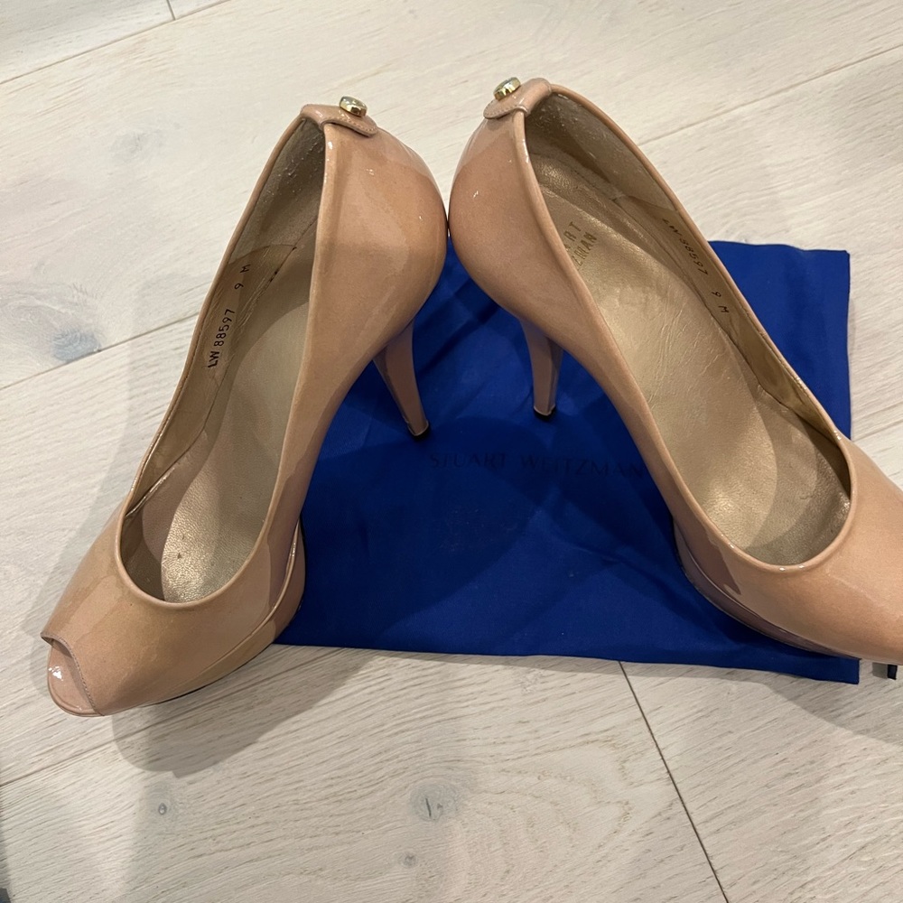 Stuart Weitzman. Nude colored patient leather peep toe platform heel. Classic.